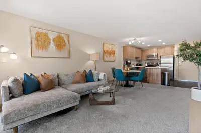 a living room with a couch and a table at Moonstone Quiet Retreat Marina Side Garden view in Los Angeles