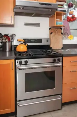a kitchen with a stainless steel stove top oven at Amenity-Rich Abbot Kinney Venice Oasis! in Los Angeles
