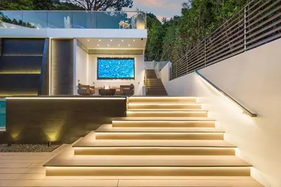 a set of stairs leading up to a house at Amara by Stay Awhile Villas in Los Angeles