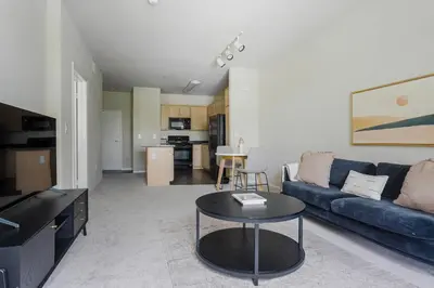 a living room with a couch and a table at Blueground Playa Vista pool nr Ballona Creek LAX-1376 in Los Angeles