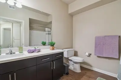 a bathroom with a sink and a toilet and a mirror at Modern 1bd apt in Marina del Rey w Free Parking in Los Angeles