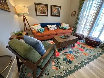 a living room with a couch and a table at Stylish Highland Park Home in Los Angeles