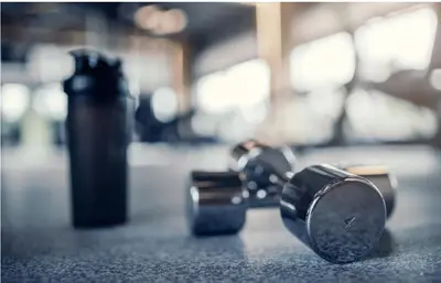 a group of dumbbells sitting on a table at Luxe Stay Marina Del Rey in Los Angeles