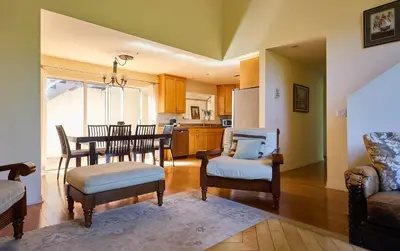 a kitchen and dining room with a table and chairs at Malibu Nature Escape - 2BR Hideaway Nestled in the Woods, Minutes from the Beach in Malibu