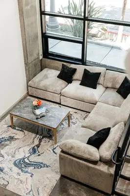 a living room with a couch and a coffee table at Palm & Vine MODERN COZY LOFT in HOLLYWOOD, FREE Parking in Los Angeles