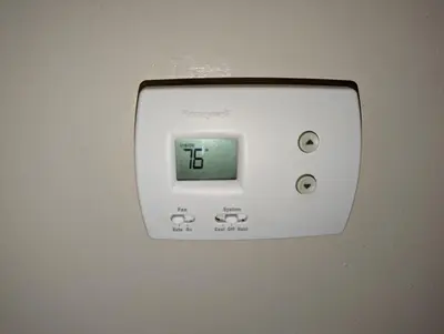 a white lightswitch on a wall with the letter f at STADIUM LUXURY - CONDO for 4 STEPS AWAY FROM SOFI in Inglewood