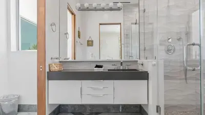a bathroom with a sink and a shower at Luxe 8000 sqft w 2 Pools Sauna Putting Green Game Room Alta Vista Estate in Los Angeles