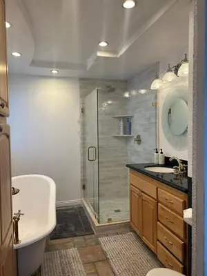 a bathroom with a shower and a sink and a toilet at Cozy Beach Bungalow- Happynest in Long Beach