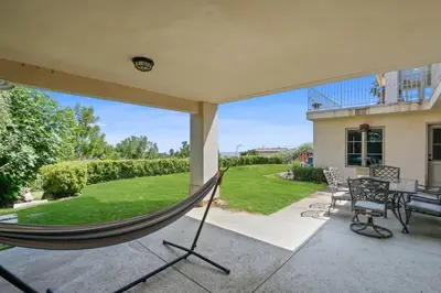 a hammock on the patio of a house at City View Rancho Palos Verdes Home in Rancho Palos Verdes