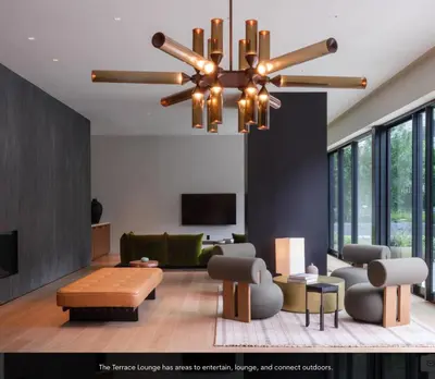 a living room with a chandelier hanging from the ceiling at Sky High at Beaudry 2 Bed Apt WITH FREE PARKING in Los Angeles