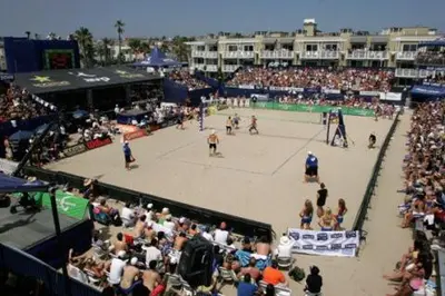a large crowd of people watching a volleyball game at Awesome On The Strand, Hermosa Beach Property in Hermosa Beach