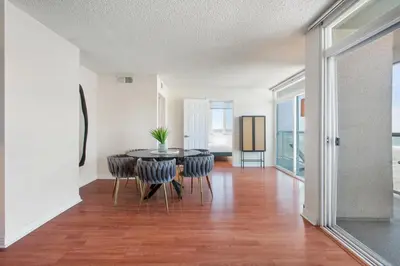 a dining room with a table and chairs at Top Floor Marina Escape 3BR Penthouse Ocean View in Los Angeles
