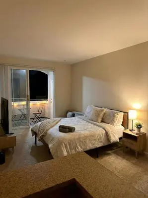 a bedroom with a large bed and a large window at Marina Del Rey 2-Bedroom and 1-Bedroom - Close To Beach in Los Angeles