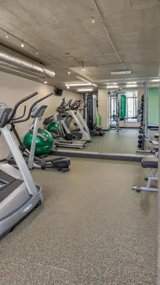 a gym with treadmills and elliptical machines at Modern Boutique Living in Culver City in Los Angeles