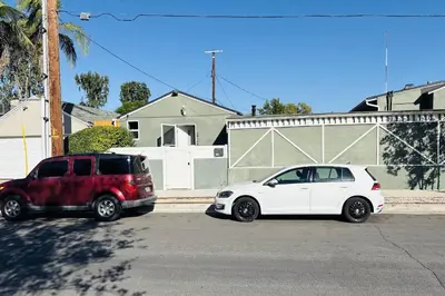 two cars parked next to each other on a street at Coldwater Canyon ADU in Los Angeles