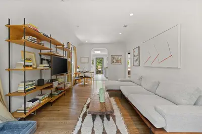 a living room with a couch and a table at New Listing Midcity West Villa by Colby & Conrad in Los Angeles