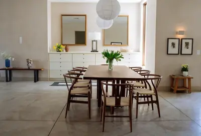 a dining room with a table and chairs at Stylish Penthouse in West Hollywood in Los Angeles