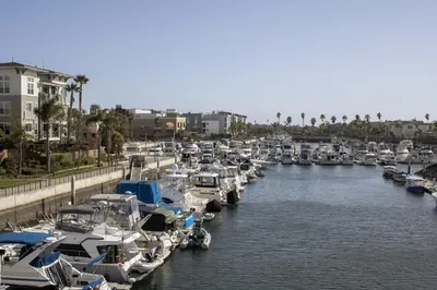 a bunch of boats are docked in a marina at Harbor View in Oxnard