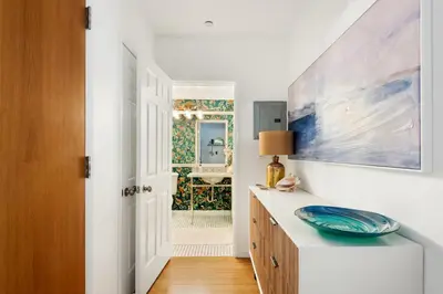 a bathroom with a sink and a mirror at Oceanfront Artists Retreat Santa Monica Luxury in Los Angeles
