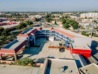 an overhead view of a city with buildings at Downey Inn in Downey