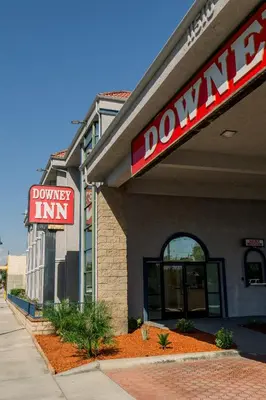 a dunkin donuts building with a sign on it at Downey Inn in Downey