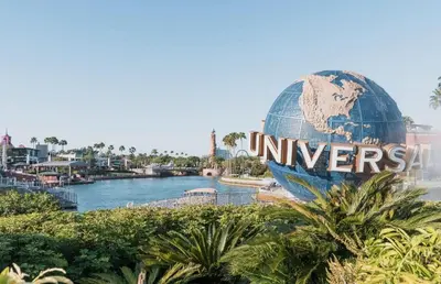 a large sign for the universal studios world globe at Grand 4-Bedroom - Brand New - Free parking and Patio in Los Angeles