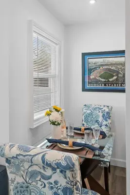 a dining room with a table and two chairs at New Listing City Bungalow by Colby & Conrad in Los Angeles