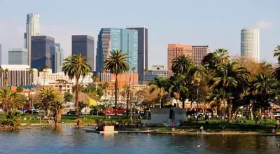 a city skyline with palm trees and a body of water at Luxury House 3-Level 4-bedroom, Free Parking and Patio in Los Angeles