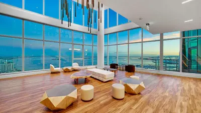 a large living room with large glass windows at Aqua Marina Oceanfront Escape in Long Beach