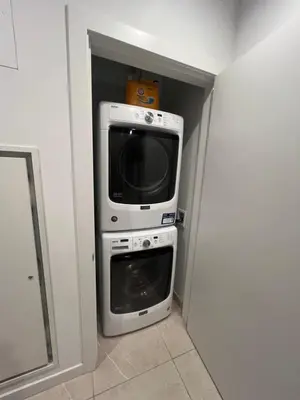 a microwave and a microwave oven in a closet at 2BR Panoramic City View!! in Los Angeles