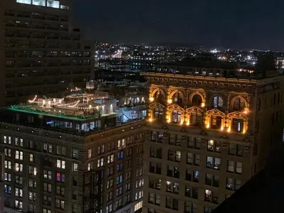a view of a building at night with lights at Luxury Vacation Resort Studio Downtown LA in Los Angeles