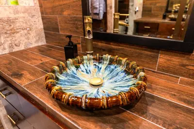 a sink in a bathroom with a blue at Spacious 2 Bedroom Condo in DTLA, Large Private Patio, Pets Welcomed in Los Angeles