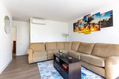 a living room with a couch and a table at Stylish2BR Patio BBQ Parking Downtown LA in Los Angeles