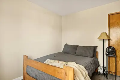 a bedroom with a bed in a room at The Pinnacle steps to the ski lifts in Big Bear Lake