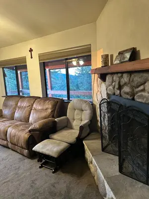 a living room with a couch and a chair at Charming Pine Mountain Home with Family Space in Frazier Park
