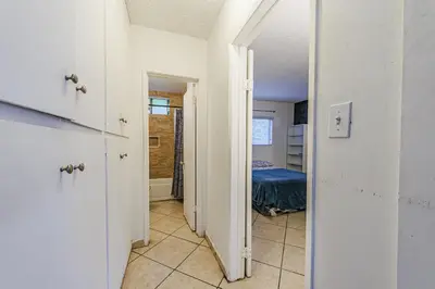 a hallway with a room with a bed in it at Excellent 1BD Berryman#10 in Los Angeles