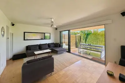 a living room with a couch and a table at Rad Stay Open Concept House in Mar Vista in Los Angeles
