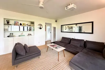 a living room with a couch and a table at Rad Stay Open Concept House in Mar Vista in Los Angeles