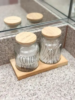 two glass mason jars on a cutting board at 2BR Coastal Retreat Walk to Beach, free parking in Los Angeles