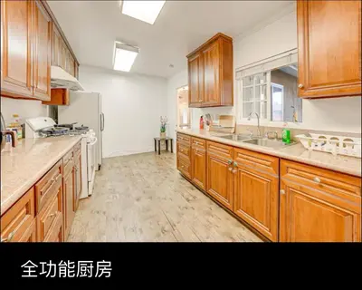 a large kitchen with wooden cabinets and a sink at Entire 4BR 4BA House in West Covina Modern Private Comfortable in West Covina