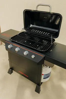 a black grill sitting on top of a table at Stylish 3BR Getaway plus Pool in Tarzana