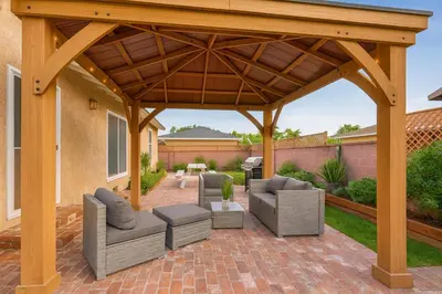 a pavilion with chairs and tables on a brick patio at Fullerton Disneyland Getaway - 4BR in Fullerton