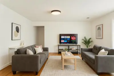 a living room with two couches and a tv at Fullerton Disneyland Getaway - 4BR in Fullerton