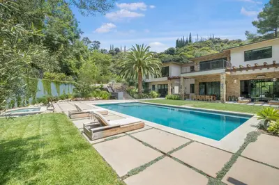 an exterior view of a house with a swimming pool at Bowmont in Los Angeles