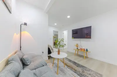 a living room with a couch and a table at Cozy & Brand New 3BR Home in West Covina in West Covina