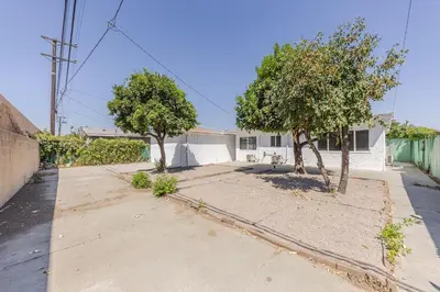 a white house with two trees in the driveway at Cozy & Brand New 3BR Home in West Covina in West Covina