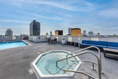 a hot tub on the roof of a building at Cozy and Stylish Unit CC 107 in Los Angeles