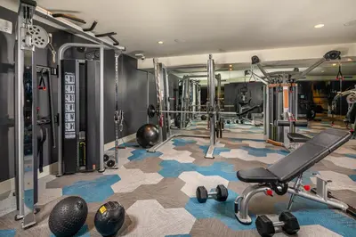 a fitness room with a gym with weights at Luxury by the Beach with Pool, Gym, Game Room in Los Angeles