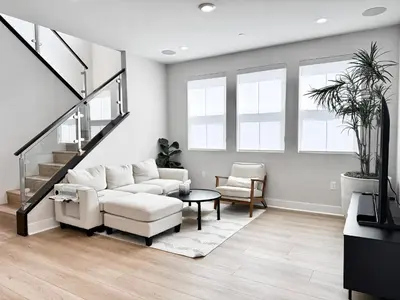 a living room with a couch and a table at #Marbella Lane - Spacious 4BR Modern Family Home! in Placentia