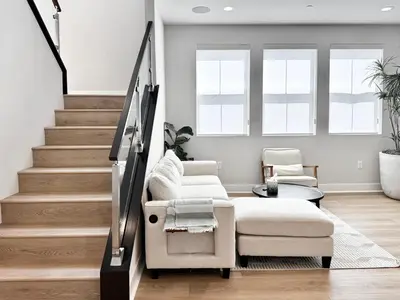 a living room with two chairs and a couch at #Marbella Lane - Spacious 4BR Modern Family Home! in Placentia